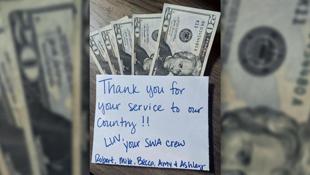 A Southwest Airlines crew found a sailor&#039;s wallet and sent him a surprise when they returned it (Photo: Courtesy of John Wesley Reid)