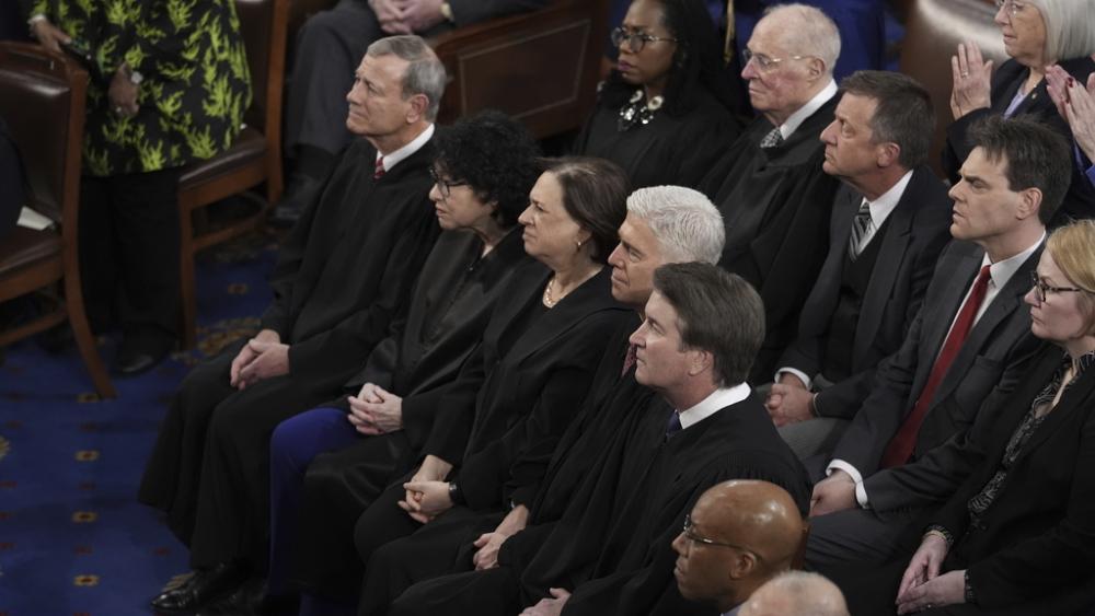 Supreme Court Justices listen as President Joe Biden delivers his State of the Union address to a joint session of Congress, at the Capitol in Washington, Thursday, March 7, 2024. (AP Photo/J. Scott Applewhite)