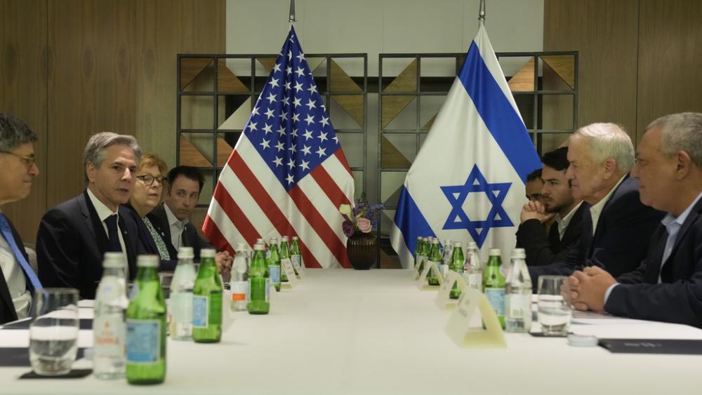 U.S. Secretary of State Antony Blinken meets with former Israel Defense Forces (IDF) chief Gadi Eisenkot, right, and former Israeli Defense Minister Benny Gantz in Tel Aviv, Israel, Feb. 8, 2024.  (AP Photo/Mark Schiefelbein, Pool)