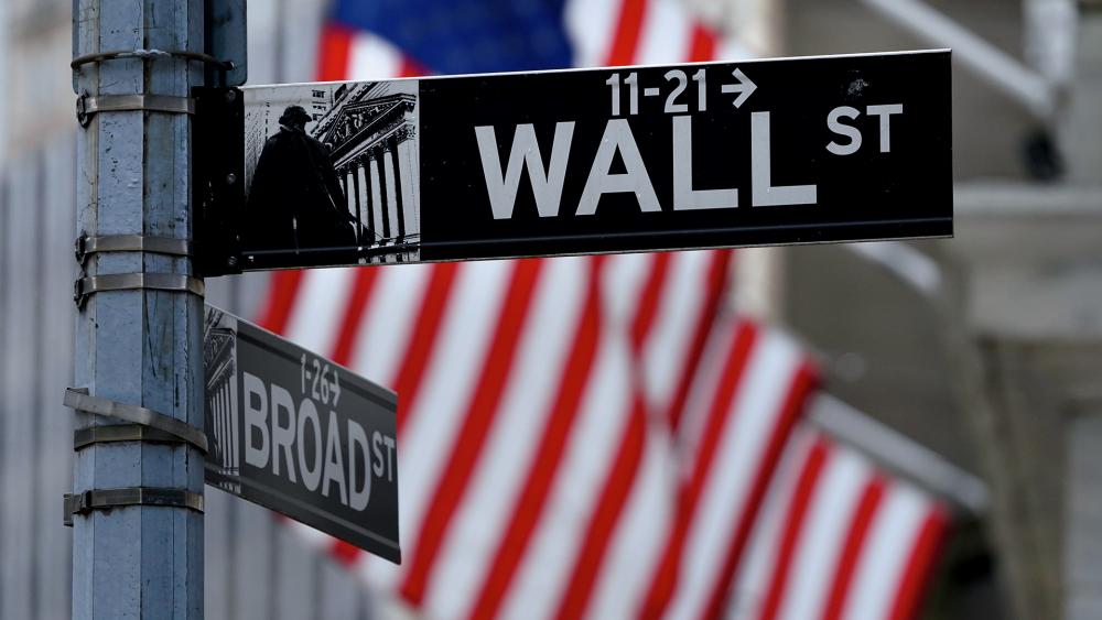 A Wall Street sign at the New York Stock Exchange in New York. (AP Photo/Seth Wenig)
