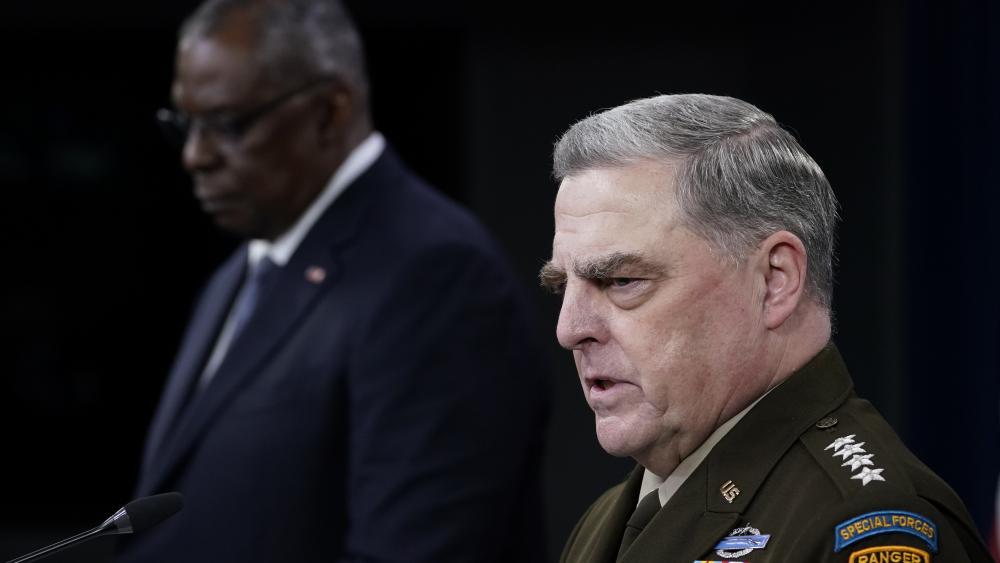 Joint Chiefs of Staff Gen. Mark Milley, right, answers a question during a briefing with Secretary of Defense Lloyd Austin, left, at the Pentagon in Washington, Wednesday, Sept. 1, 2021, about the end of the war in Afghanistan. (AP Photo/Susan Walsh)