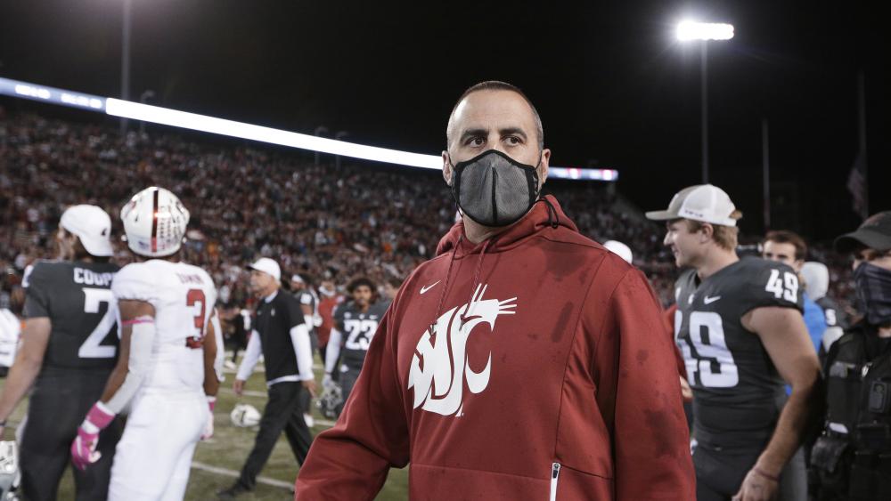 Washington State coach Nick Rolovich walks on the field after the team&#039;s NCAA college football game against Stanford, Saturday, Oct. 16, 2021, in Pullman, Wash. Washington State won 34-31. (AP Photo/Young Kwak)