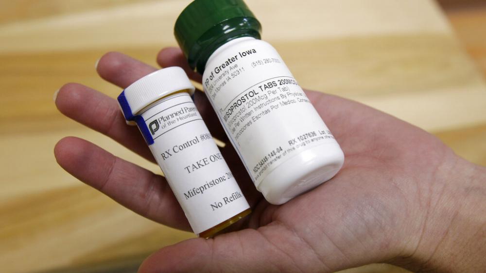 This Sept. 22, 2010 file photo shows bottles of abortion pills at a clinic in Des Moines, Iowa. (AP Photo/Charlie Neibergall, file)
