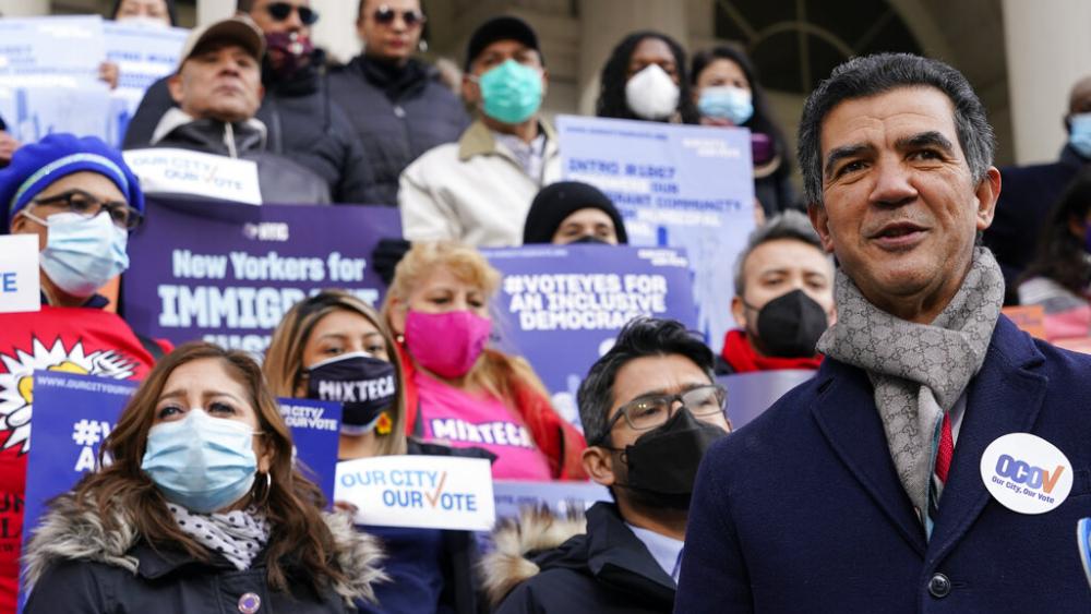 New York City Council Member Ydanis Rodriguez speaks during a rally on the steps of City Hall ahead of a City Council vote to allow lawful permanent residents to cast votes in elections. (AP Photo)