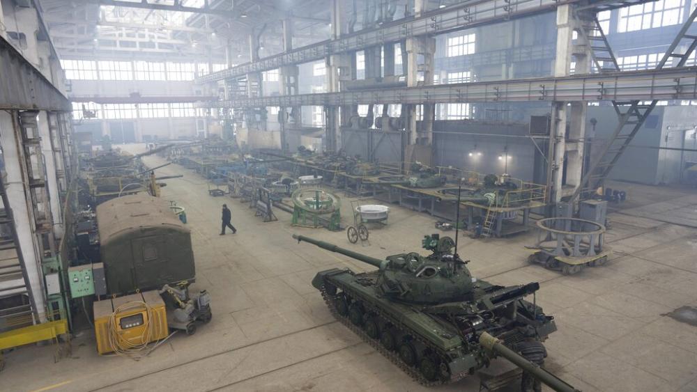 Workers repair T-64 tanks at the Tank Repair Plant in Kharkiv, Ukraine, Monday, Jan. 31, 2022. (AP Photo)