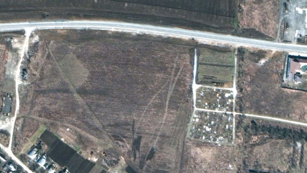 This satellite image provided by Maxar Technologies on April 21, 2022 shows overview of cemetery in Manhush, near Mariupol, Ukraine, on March 19, 2022. (Satellite image ©2022 Maxar Technologies via AP)