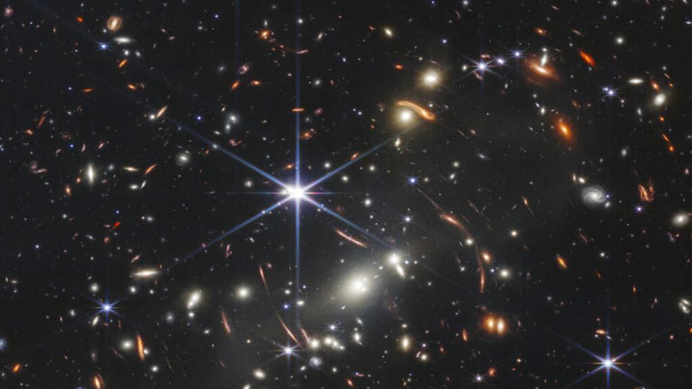 This image provided by NASA on Monday, July 11, 2022, shows galaxy cluster SMACS 0723, captured by the James Webb Space Telescope. (NASA/ESA/CSA/STScI via AP)