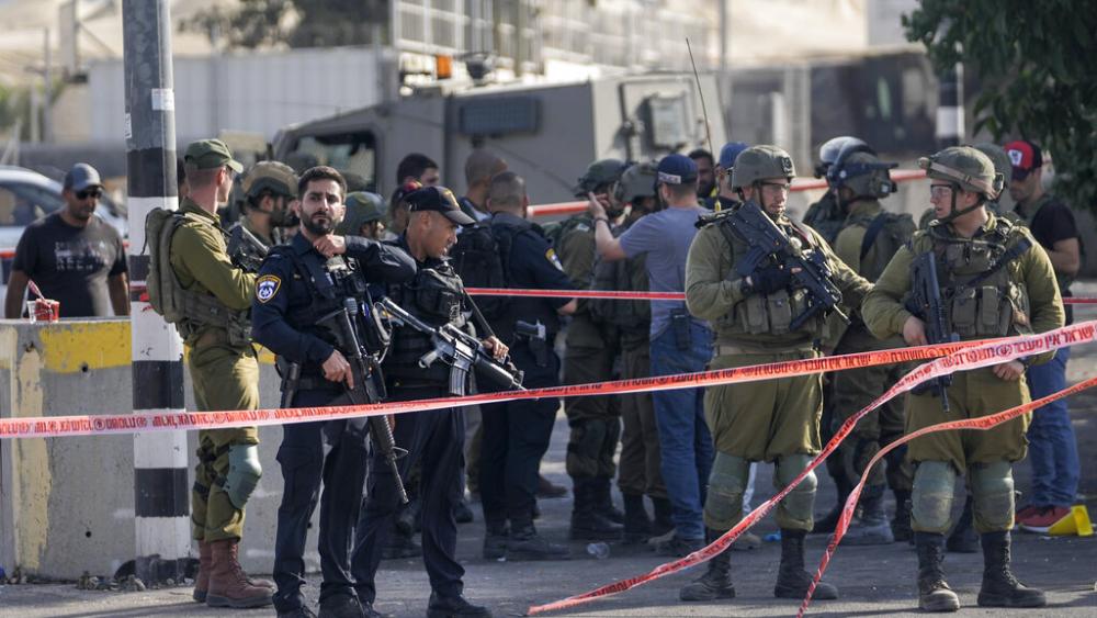 sraeli security forces examine the scene of a stabbing attack near the West Bank Jewish settlement community of Kiryat Arba, next to the city of Hebron, Friday, Sept. 2, 2022. (AP Photo/Mahmoud Illean)