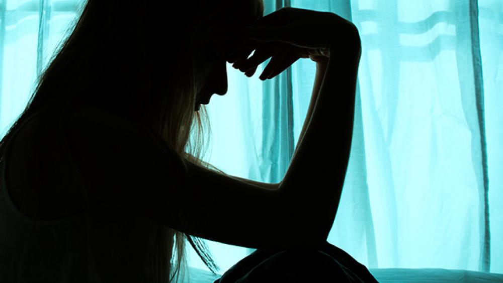 depression-silhouette-woman-window