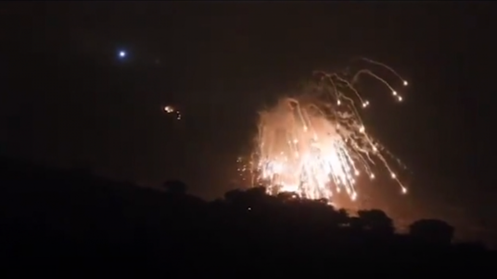 AP video screenshot: Explosion in Houla, South Lebanon as the IDF attacks Hezbollah targets. 