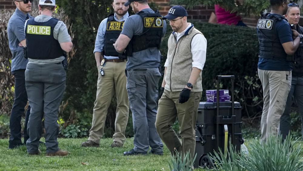 Authorities investigate a home possibly connected to the school shooting in Nashville, Monday, March 27, 2023, in Nashville, TN  (AP Photo/John Bazemore)