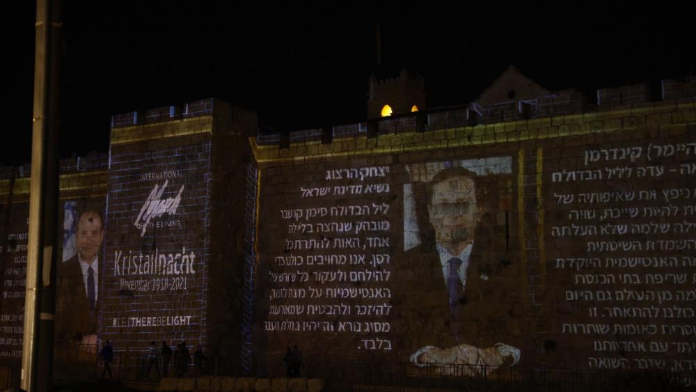 Photo of Kristallnacht Remembrance on Jerusalem&#039;s Old City walls; credit - Olivia Fitoussi.