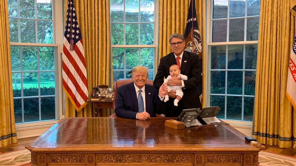 Energy Secretary Rick Perry in the Oval Office with his grandson and President Trump