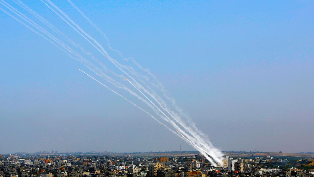 Rockets are launched from Gaza Strip towards Israel, Tuesday, May 11, 2021. (AP Photo/Hatem Moussa)