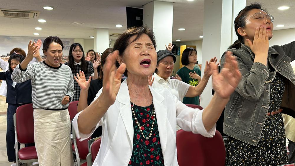 South Korean Christians pray for the reunification of the North and South and freedom for North Korea. Photo Credit: CBN News. 