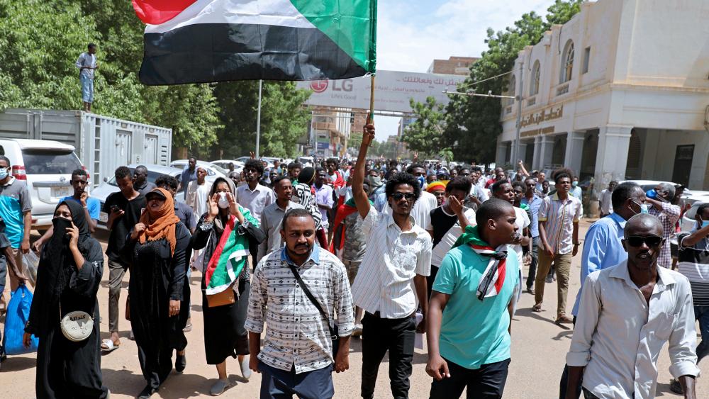 Sudanese protesters rally outside the Cabinet’s headquarters in the capital, Khartoum, Sudan, Monday, Aug. 17, 2020. (AP Photo/Marwan Ali)
