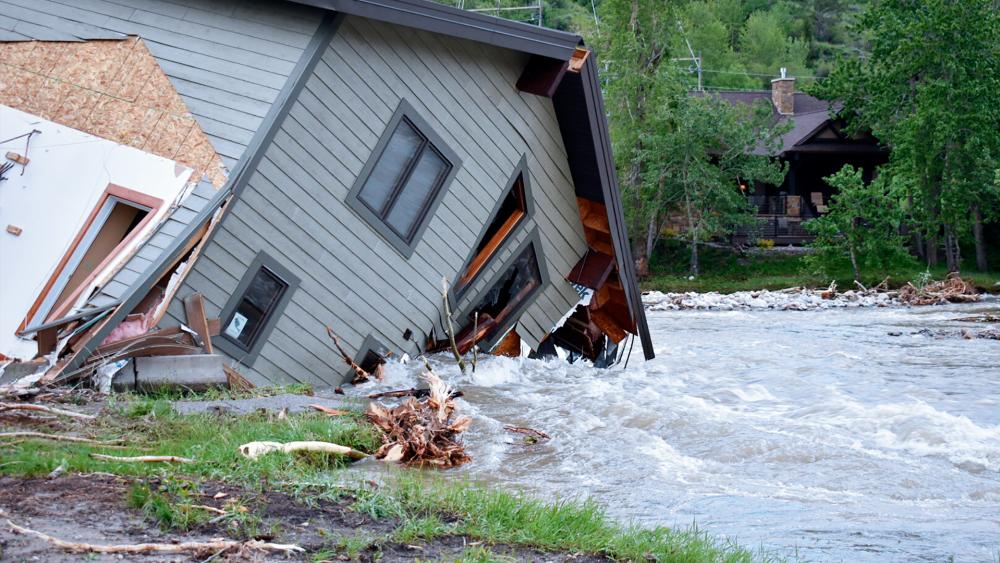 Raging floodwaters hit more than 100 houses in the small city of Red Lodge, Montana as flooding has slammed the Yellowstone region. (AP Photo/Matthew Brown)
